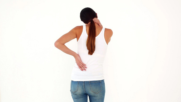 Slim Model In Jeans With Back And Neck Ache