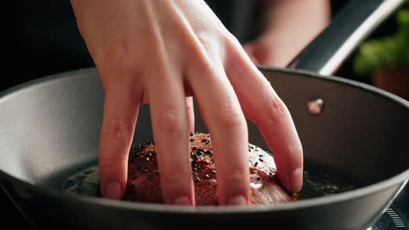 Frying Burger Bread in Pan Closeup