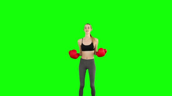 Slim Model Cheering With Red Boxing Gloves