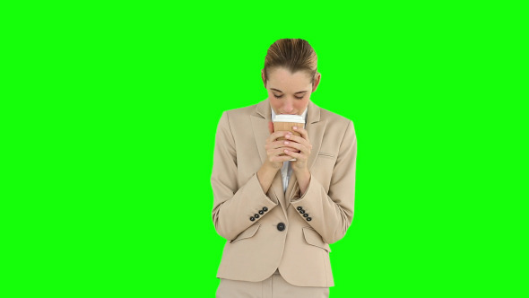 Businesswoman Drinking Coffee To Go 1