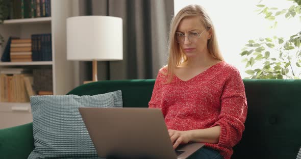 Woman with Laptop at Home