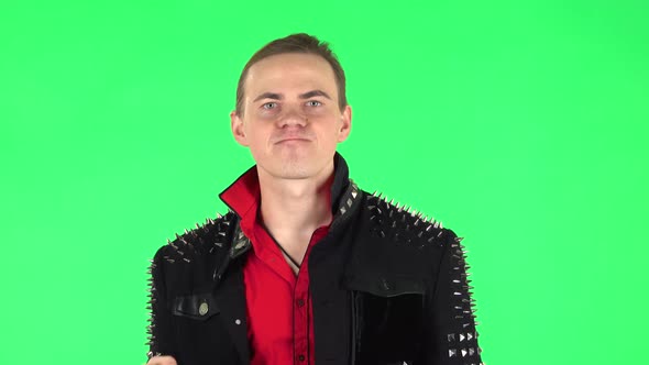 Annoyed Man Gesturing in Stress Expressing Irritation and Anger. Green Screen