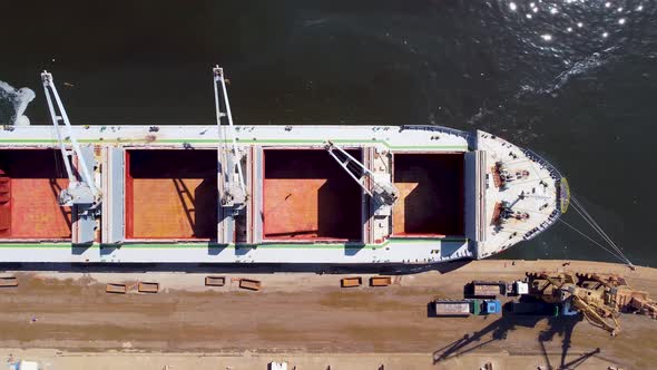Container cargo freighter ship at landmark Rio de Janeiro harbor.