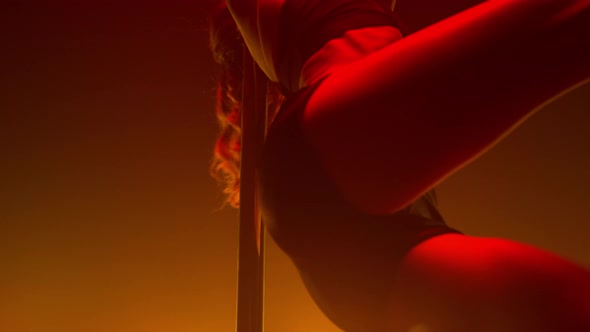 Fit Woman Dancing Erotic Moves in Strip Club