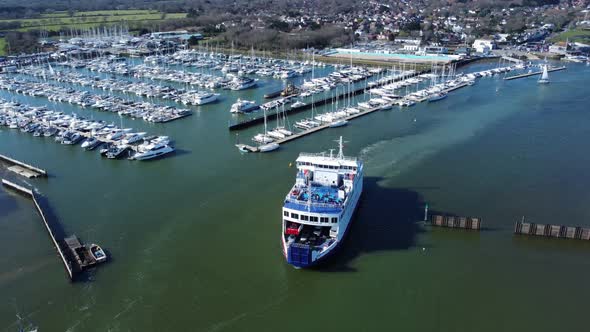 Ferry leaving port through the harbour barriers