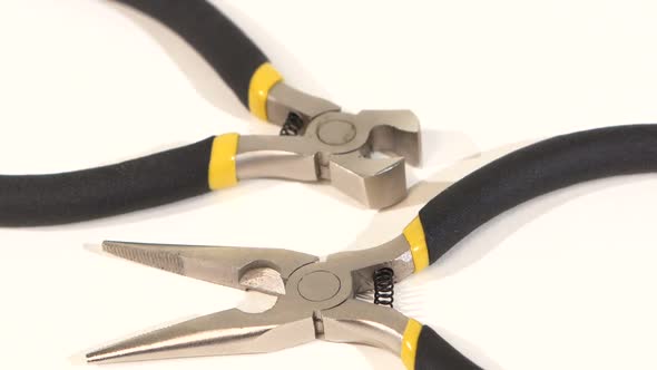 Wire Cutters and Mini Cutters on White, Rotation, Close Up