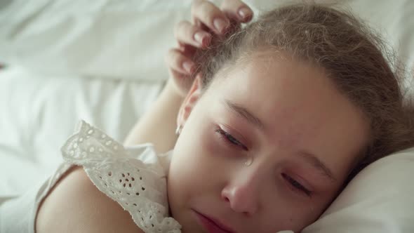 Portrait Cute Upset Child Little Girl with Big Tears Flowing Down His Cheekschild Lies at Home on