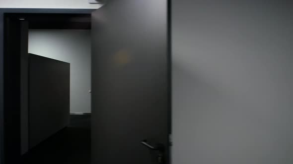 The Camera Flies Through the Doorway in Front of the Sports Locker Room