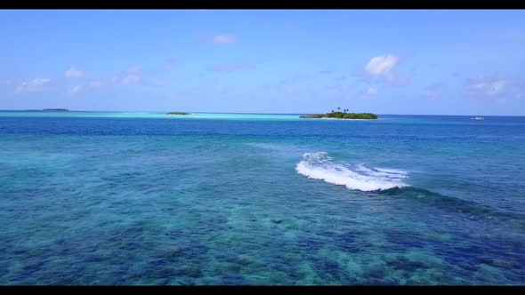 Aerial top down abstract of relaxing coast beach journey by blue water with clean sandy background o