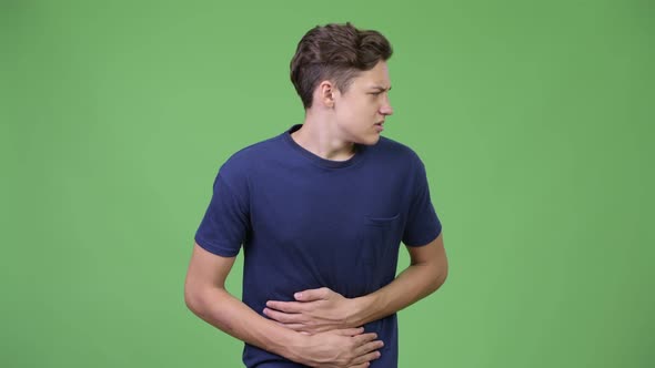 Young Teenage Boy Having Stomach Ache