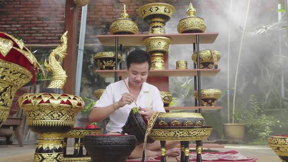 Man Making Lao Lacquer ware