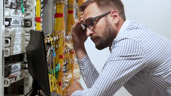 Engineer Working in Data Room