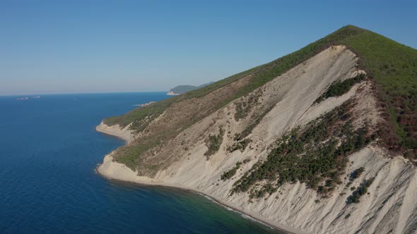 Aerial View of Stone Rock and Coast Line Blue Sea Water Beautiful Nature