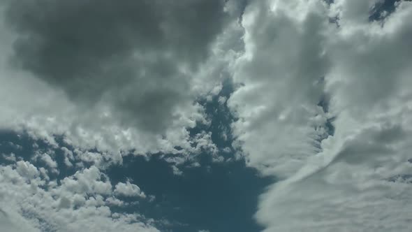 Natural Cumulus Rain Clouds On Blue Clean Sky