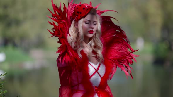 Red Queen is Walking in Forest Magical and Fantasy Shot of Medieval or Fairytale Character