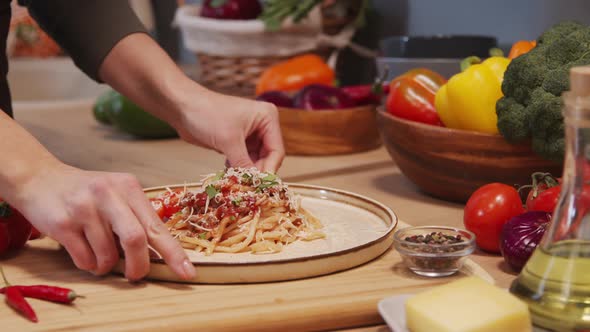 Serving Plate with Spaghetti Bolognese on Kitchen Table