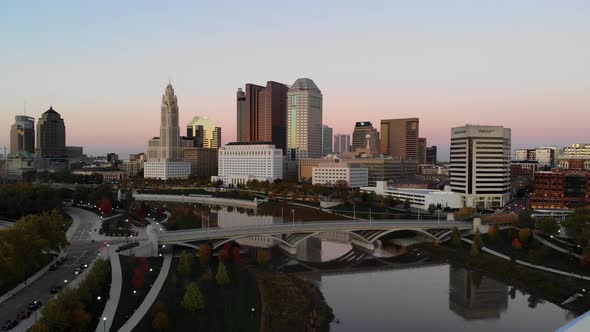 Columbus Ohio Skyline at dusk with the Scioto River in the foreground