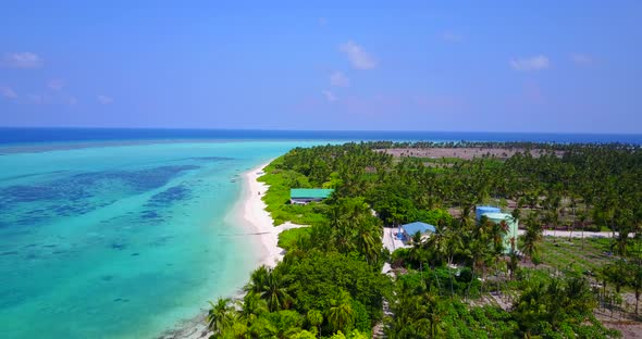 Tropical aerial abstract view of a sunshine white sandy paradise beach and turquoise sea background 