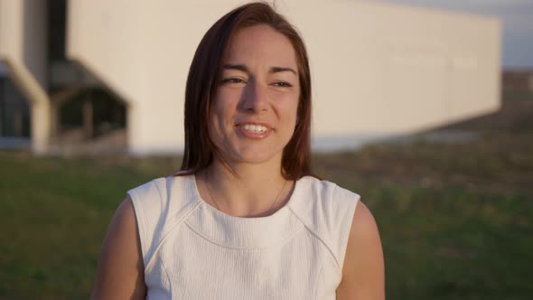 Beautiful Smiling Redhead Woman Talking To Camera