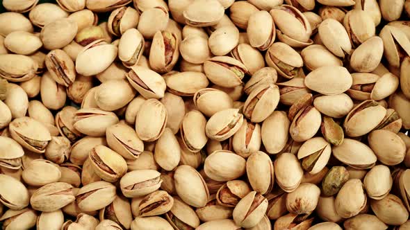 Roasted Pistachio Nuts as Food Background 