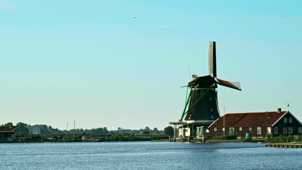 Windmills at Zaanse Schans in Holland on Sunset. Zaandam, Nether