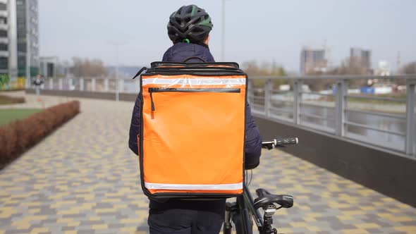 Food Courier with Thermal Backpack Carrying Bike
