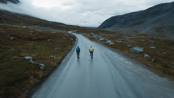 Epic Aerial Drone Shot of Two Cyclists Exploring