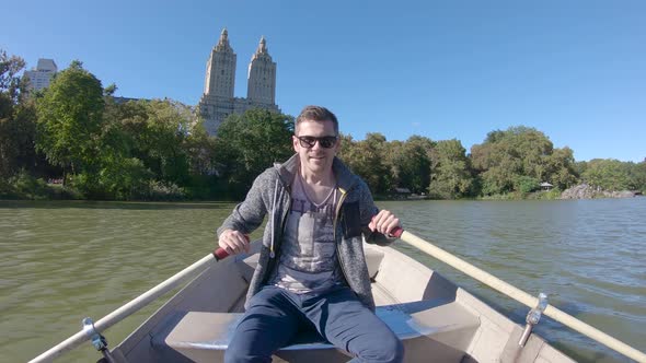 Enjoying the boat ride in Central Park, Manhattan, New York, USA