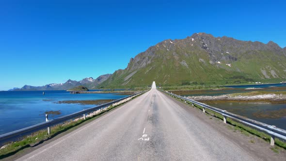 Driving a Car on a Road in Norway