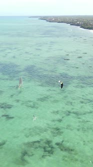 Boat Boats in the Ocean Near the Coast of Zanzibar Tanzania Slow Motion Vertical Video