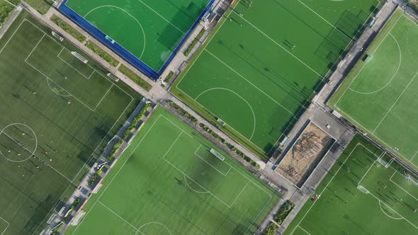 Recreational Green Grass Active Sports Hockey and Football Fields Overhead Top Down View