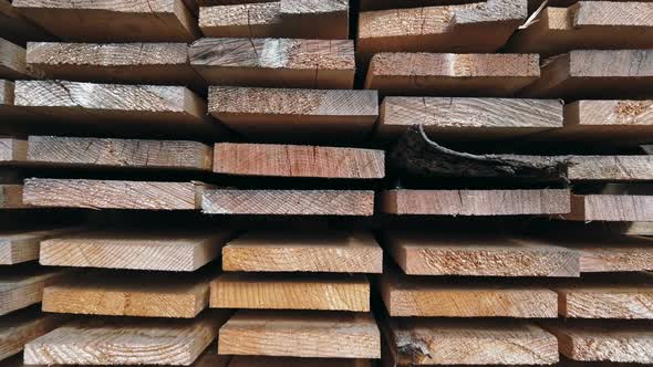 Sawn Boards in a Stack. Lumber at a Sawmill or Building