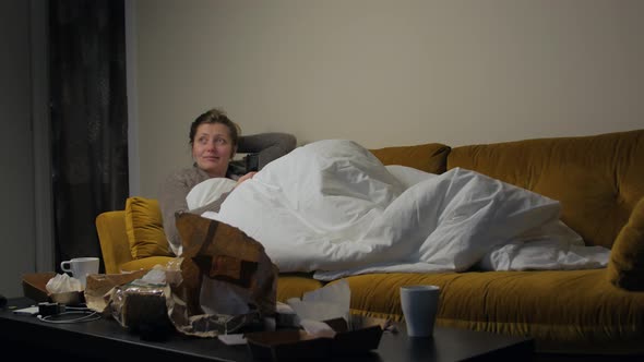 Girl Watching TV On Couch