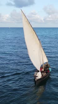 Boat Boats in the Ocean Near the Coast of Zanzibar Tanzania Slow Motion Vertical Video