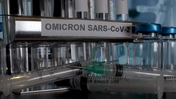 Omicron SARS-CoV-2 Test Tube Vials Being Removed From Rack. Close Up, Static Shot