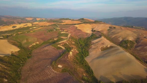 Aerial Nature Landscape Beautiful Hills Forests Fields and Vineyards of Tuscany, Italy
