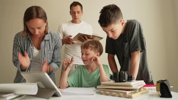 Parents Doing Homework with Kids