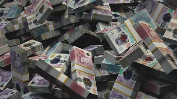 Stacked British Money Falling | pound | Currency GBP | £ | 4K Resolution