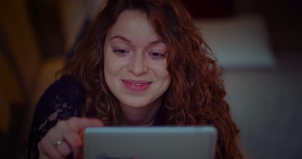 Portrait of Young Successful Female Shopping Online