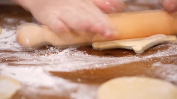 Step by step. Rolling dough for home made empanadas.