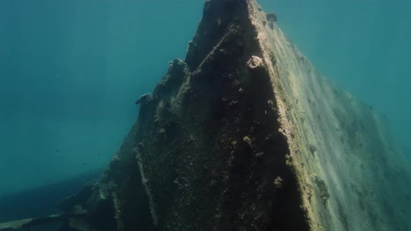 Scuba diver next to a wreck