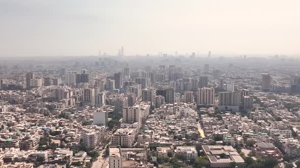 Aerial View Over Karachi Skyline In Pakistan. Dolly Zoom In