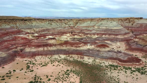 Bentonite Hills In Capitol Reef Wilderness At Daytime - aerial drone shot