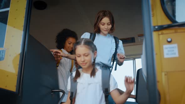 Diverse Students Going Out School Bus