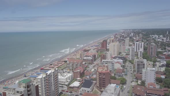 Drone shot of holiday town in the coast in summer