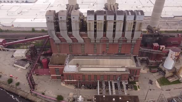 Top View Of Otto C. Eckert Municipal Power Plant Along Grand River In Lansing Michigan, USA. - Tilt-