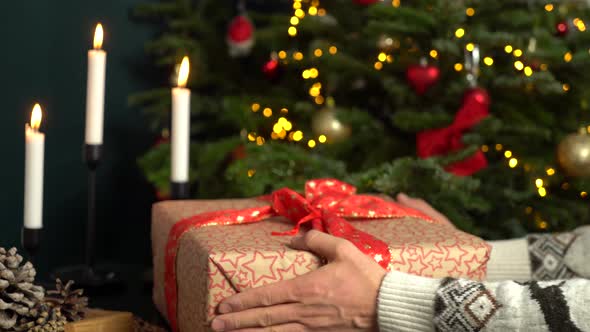 Gift box in male hands