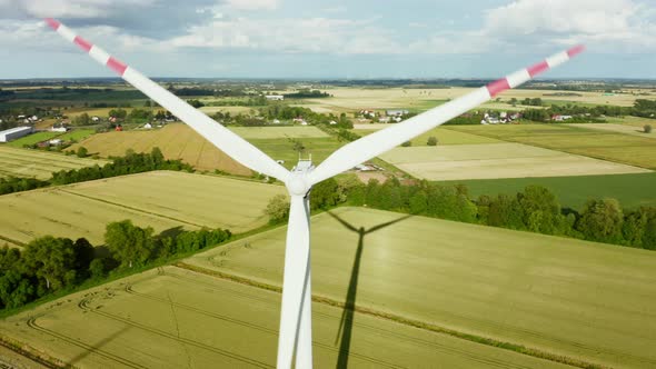 Drone View of a Scenic View of a Wind Turbine Farm During Sunset