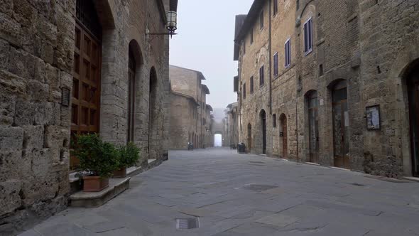 San Gimignano Old Town. Camera Moving Along the Street of San Gimignano Medieval Town in Tuscany