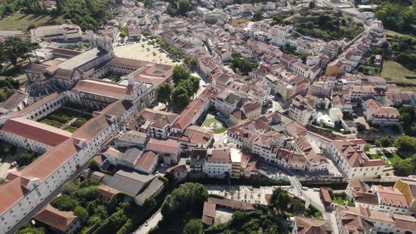 Quaint and charming Alcobaca aerial cityscape with famous medieval Monastery. Portugal